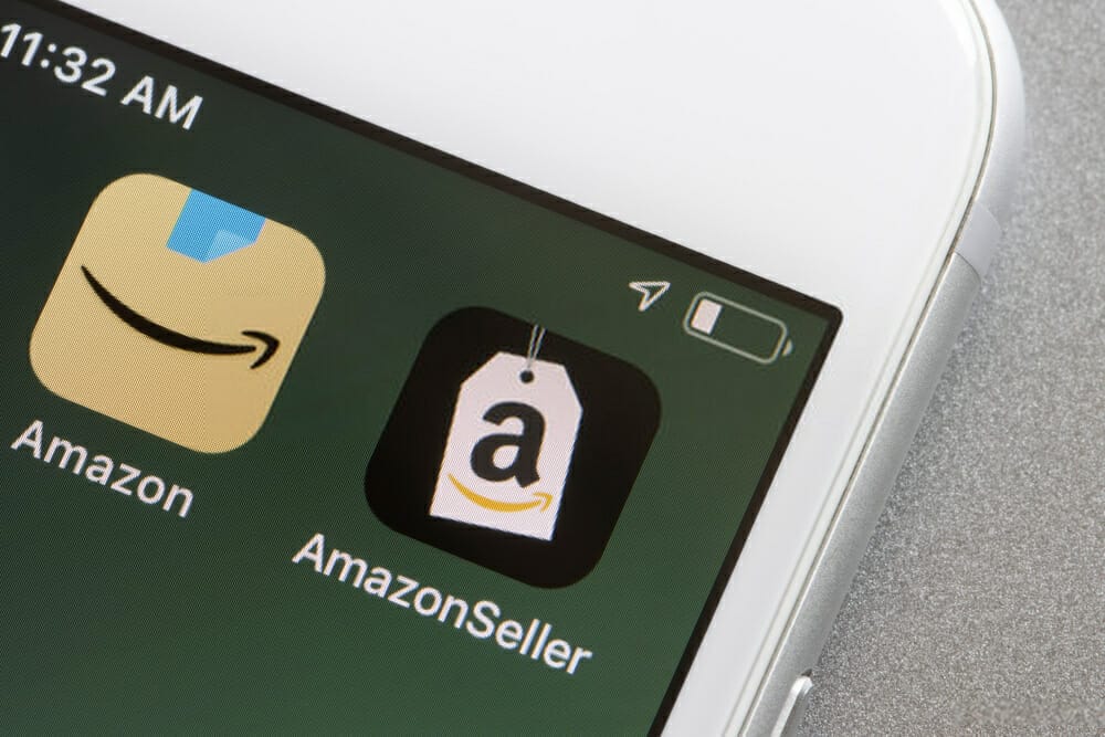 An iPhone displaying the Amazon seller logo with Amazon Product Liability Insurance.